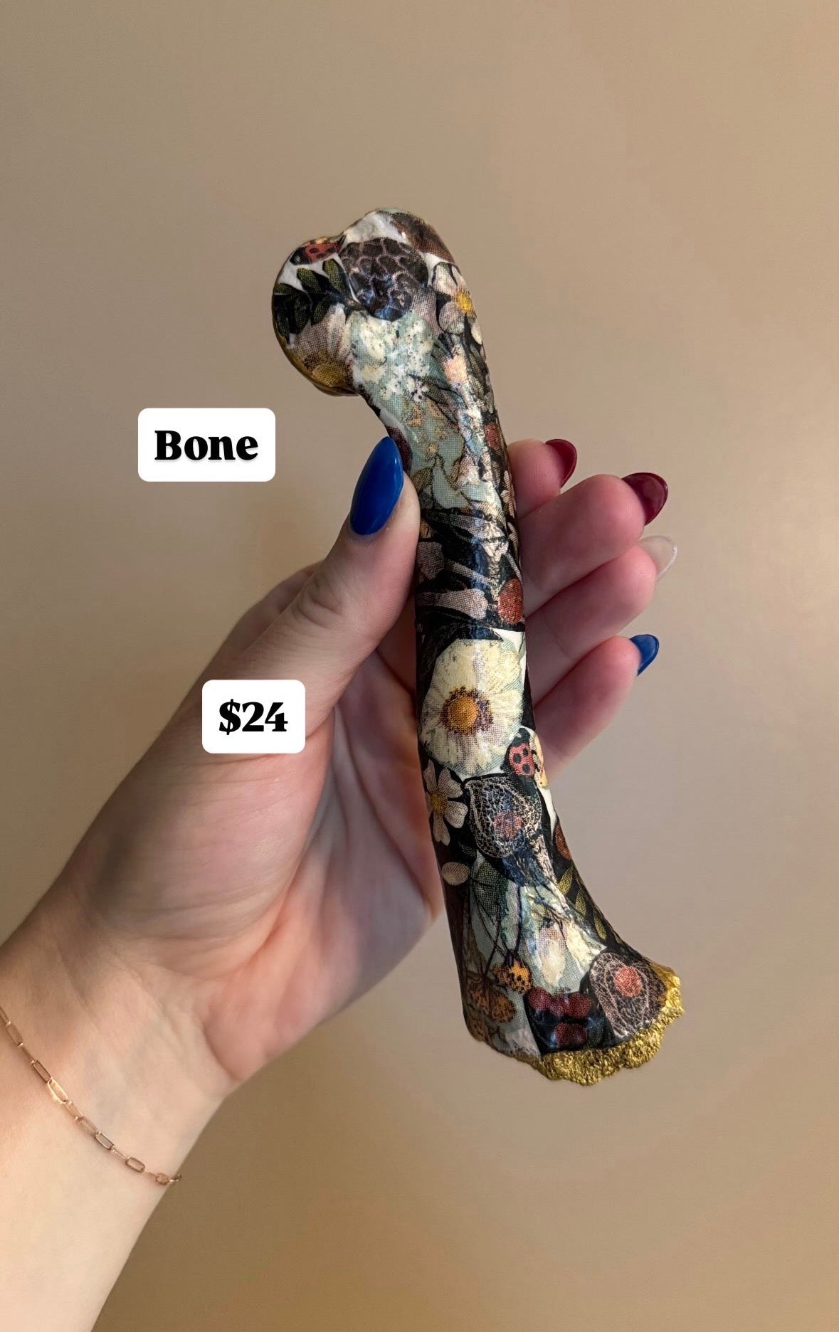 2 necklaces and 1 decorated bone