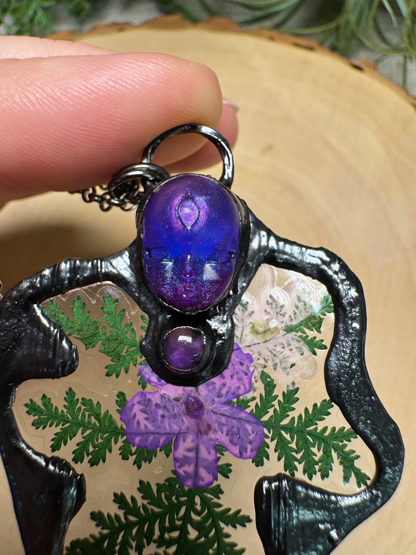 Enyalia- Resin Face, Amethyst, and Flower Necklace