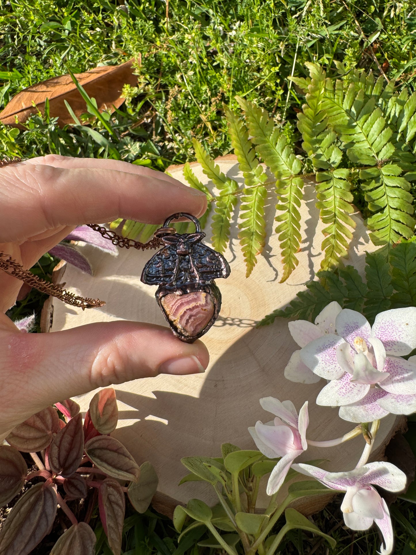 Rhodochrosite Moth Necklace (slight damage to stone)