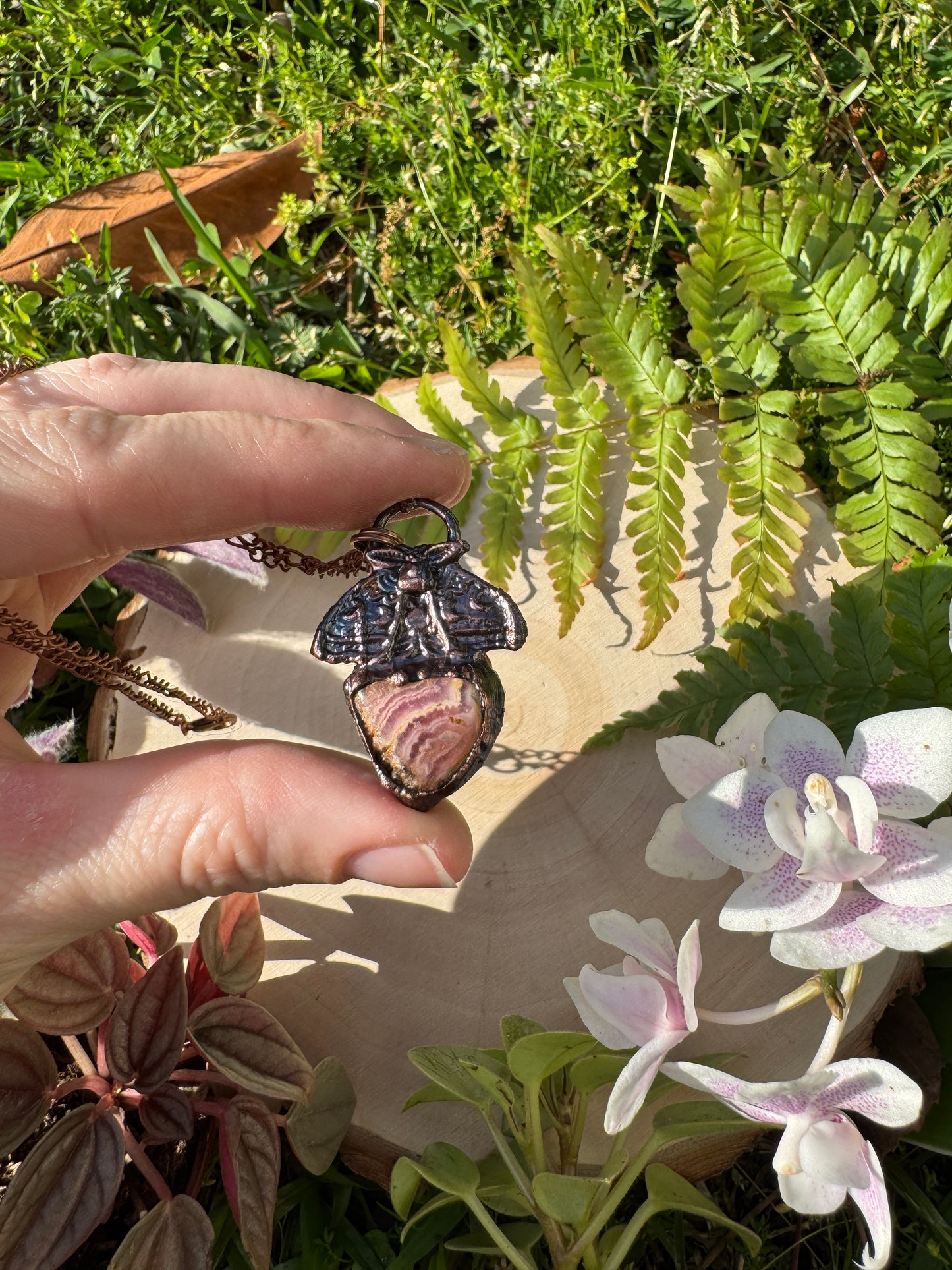 Rhodochrosite Moth Necklace (slight damage to stone)
