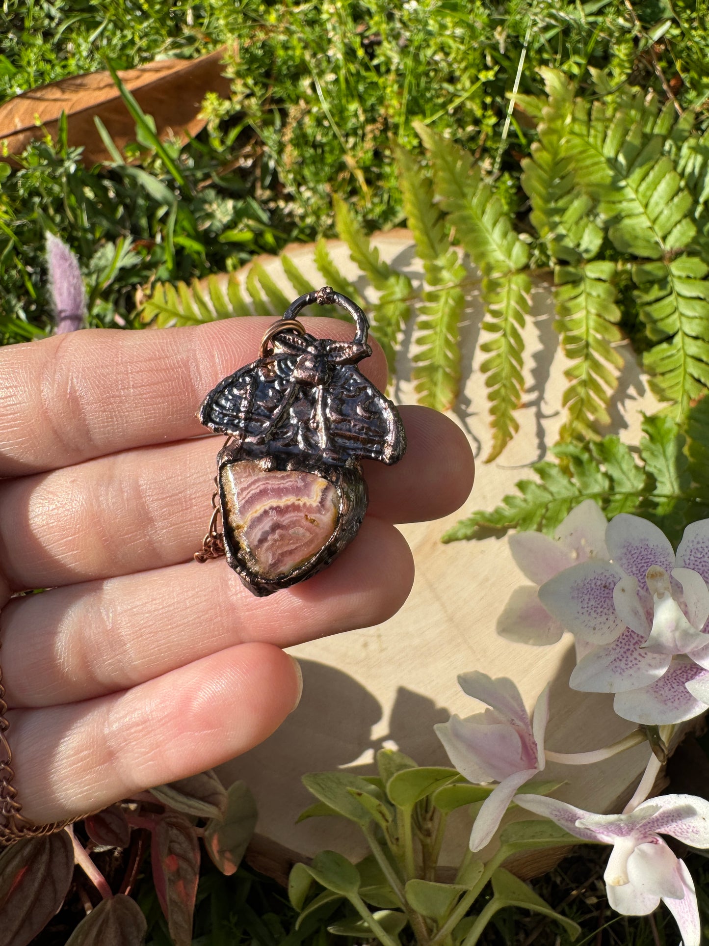 Rhodochrosite Moth Necklace (slight damage to stone)