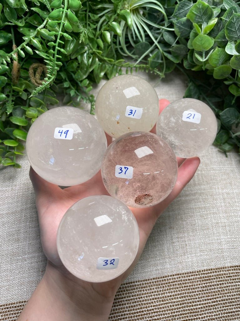 Clear Quartz Sphere | Copper Ashes